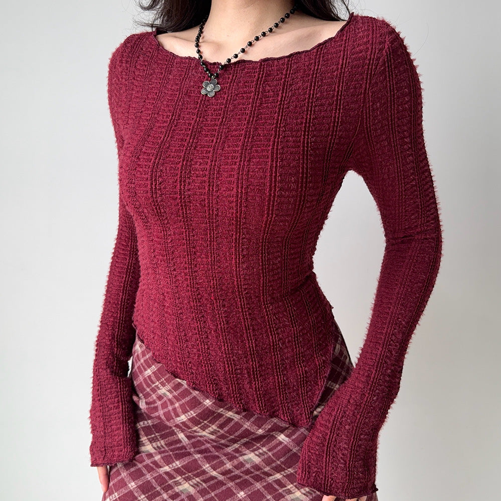 frazzled english woman asymmetrical knit top