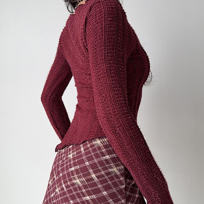 frazzled english woman asymmetrical knit top