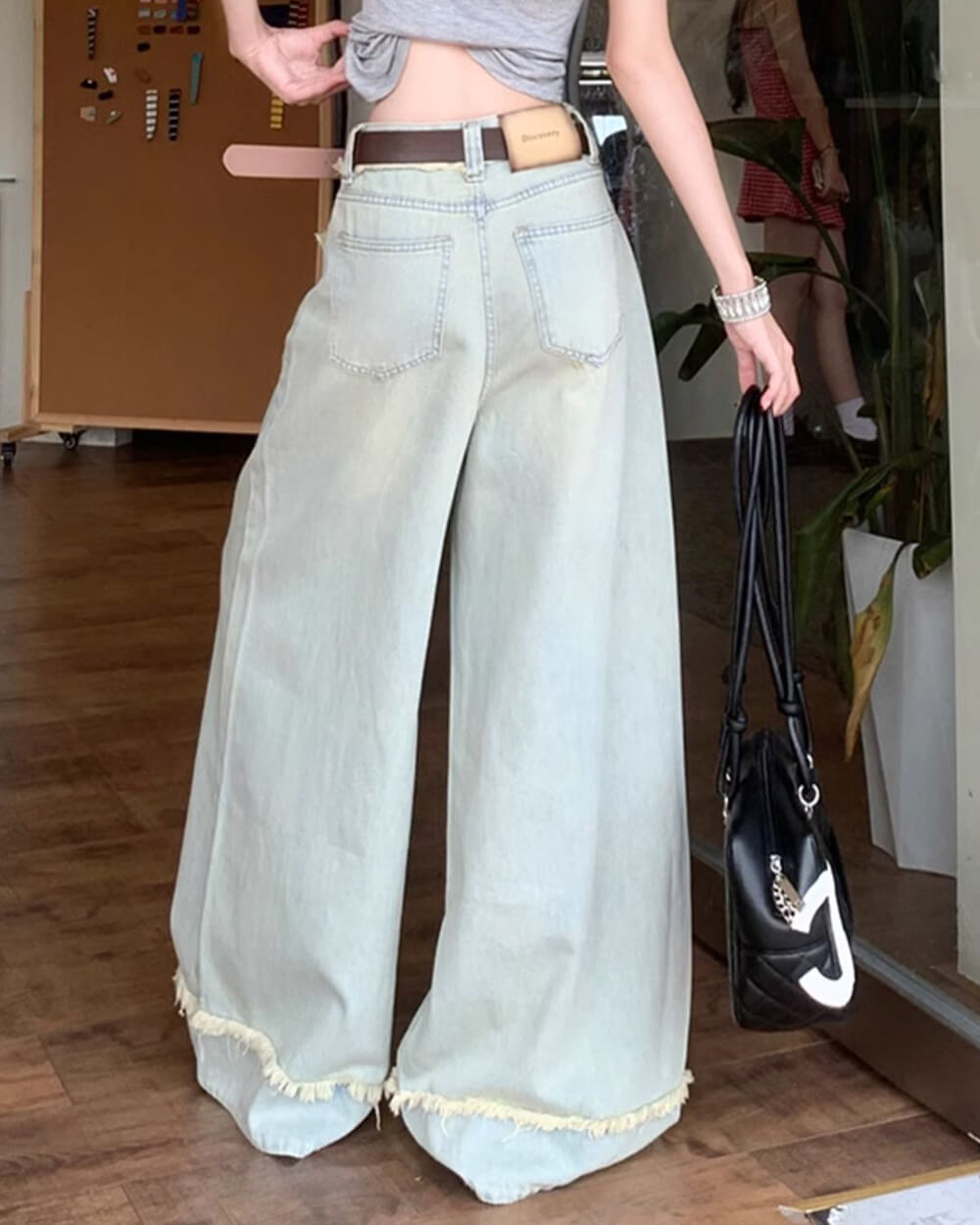 light blue frayed wide leg jeans